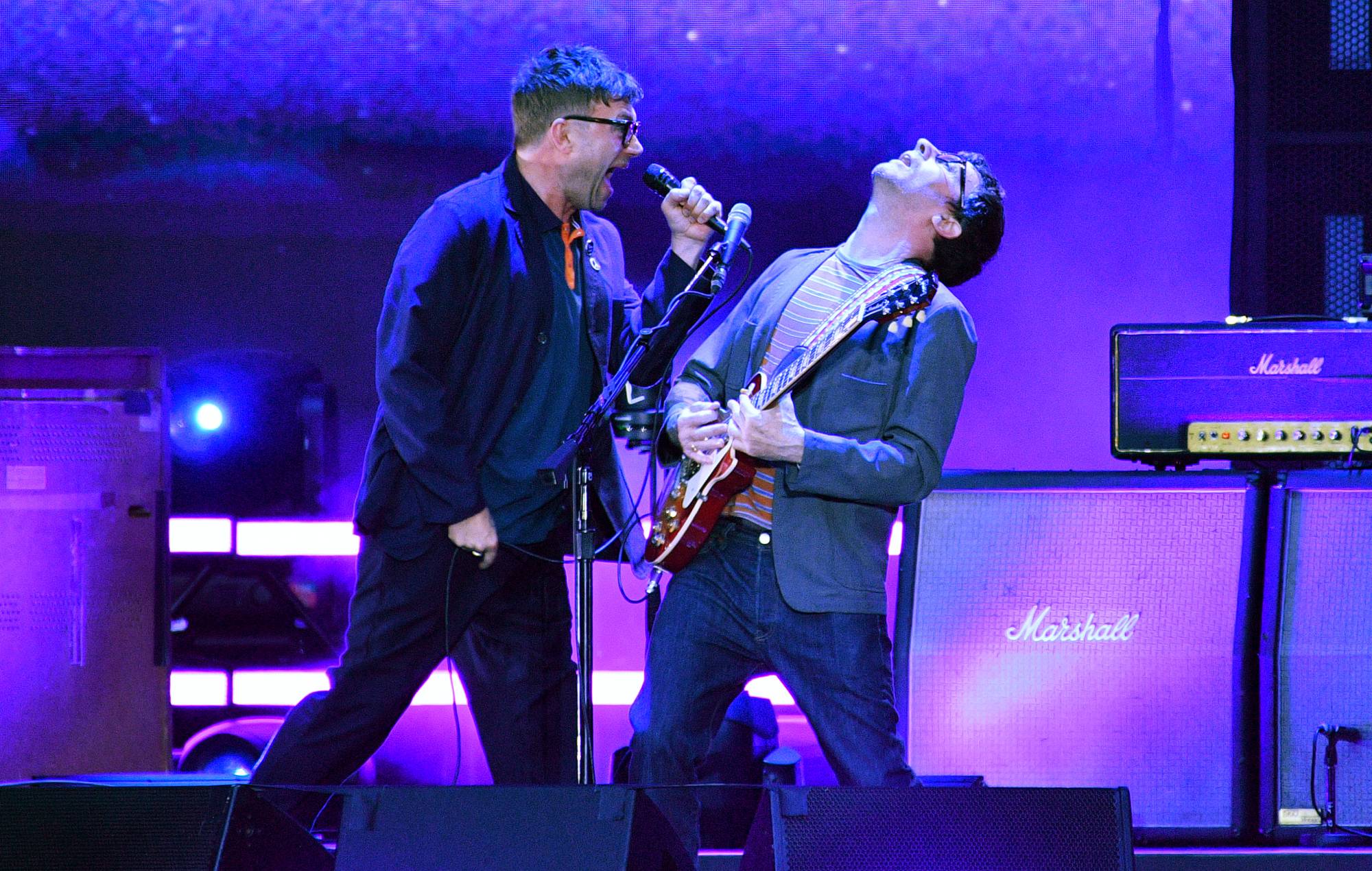 Damon Albarn and Graham Coxon of Blur perform at Wembley Stadium on July 08, 2023 in London, England. (Photo by Jim Dyson/Getty Images)